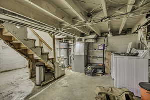 Unfinished below grade area with stairs, heating unit, and strapped water heater