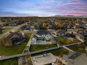 Aerial view at dusk of a residential view and a mountain view