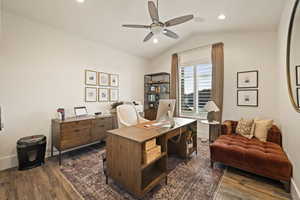 Office with vaulted ceiling, ceiling fan, dark wood-style flooring, and recessed lighting
