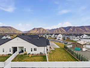 View of mountain backdrop with nearby suburban area