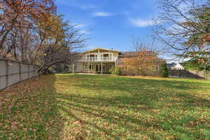 Best wide aerial shot capturing full backyard & home rear elevation.