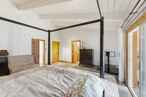 Primary Bedroom Shows flow to hall & sunroom.