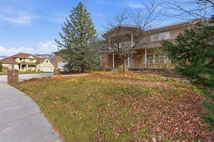 Shows full depth of the porch and lighting.
