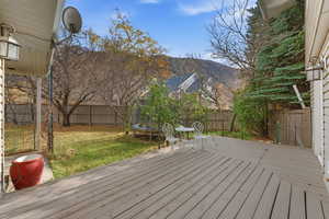 Exterior deck looking into backyard.