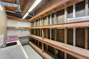 Storage Room #2 – Work SinkWorkshop with shelving & sink.
