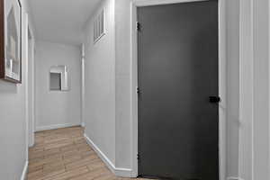 Laundry room door off of hallway