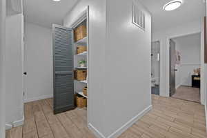 2 storage closets: Hallway linen closet across from an extra deep coat closet under the stairs.