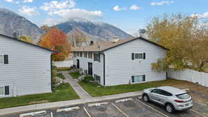 View of property exterior featuring a mountain view