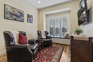 Den/Office with solid hardwood hickory flooring  and recessed lighting