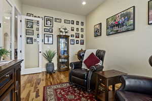 Den/Office with solid hardwood hickory flooring and recessed lighting