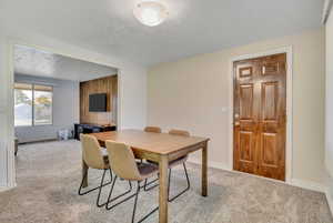 Spacious Dining area with doorway to attached Garage.