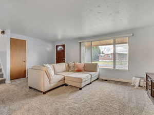 New carpet and bright, open living.