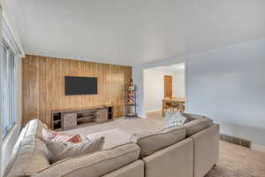 Open, bright living room right off the front door and adjacent to the dining room!