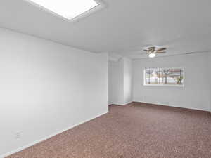 Giant downstairs room could be divided and make a fourth bedroom if needed. View to the East