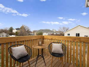 Wooden deck overlooking a massive backyard for garden, extra cars or toys or RV! Perfect to see great sunsets too!