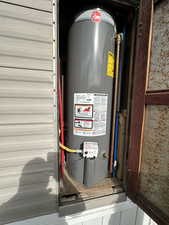 Utilities featuring gas water heater