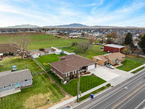 Aerial view of residential area featuring a mountain backdrop