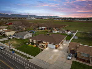 Aerial view at dusk of a mountain view and a rural view