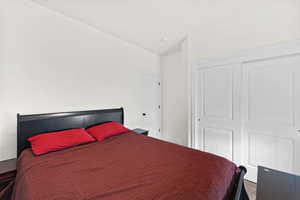 Bedroom featuring a closet