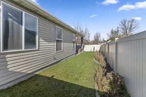 View of fenced backyard
