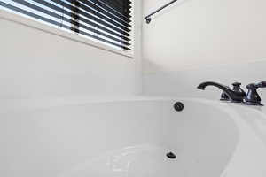 Bathroom view of a tub