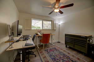Bedroom 2 or Office area with wood finished floors and ceiling fan