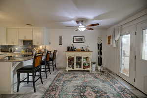 Dining space featuring counter and dining table space