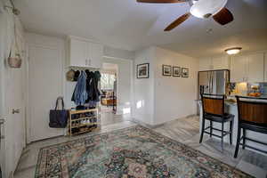 Dining area with view to LR. Pantry closet and access door to garage