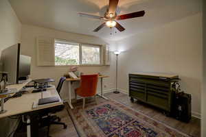 Home or bedroom 2  featuring new wood laminate floors and ceiling fan