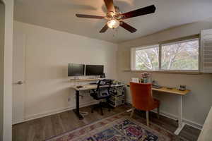 Bedroom 2 or Office area with wood finished floors and a ceiling fan