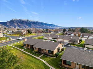 Aerial view of residential area featuring mountains to the south east, Weber Canyon and HW89, I84 & I193