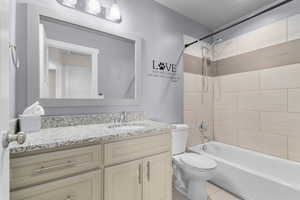 Full bathroom with vanity and tub / shower combination