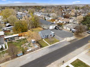 Aerial perspective of suburban area with a mountain backdrop