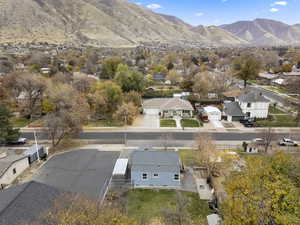 Aerial view of residential area featuring a mountainous background