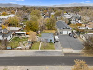 Aerial view of residential area featuring a mountain backdrop