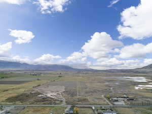 Aerial view of sparsely populated area with mountains
