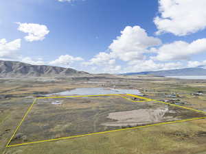 View of rural area featuring mountains and property parcel outlined