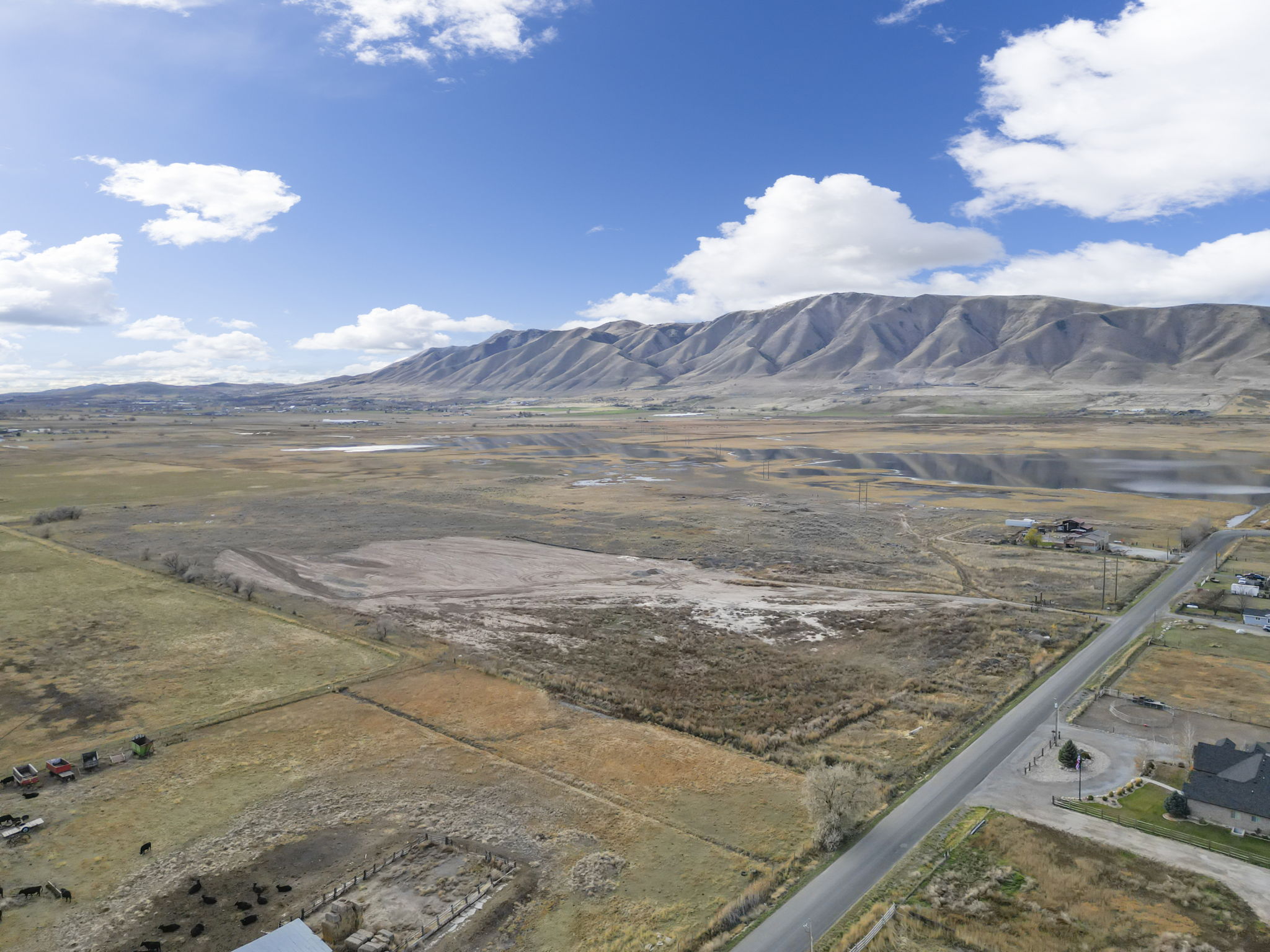 View of mountain background featuring rural landscape