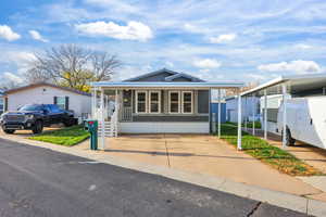 Manufactured / mobile home featuring covered porch