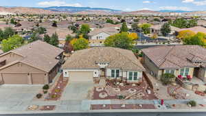 Aerial view of residential area with a mountain backdrop