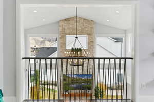 Detailed view of a chandelier and stone siding