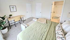 Bedroom featuring connected bathroom