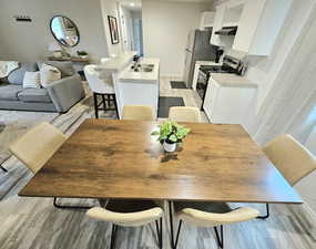 Dining room with light wood-type flooring
