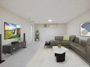 Living area featuring baseboards and light tile patterned flooring