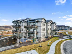 View of building exterior featuring a mountain view