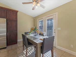 Kitchen eating area with french doors leading the deck