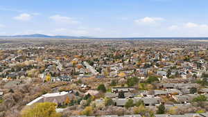 Aerial view of residential area with a mountain backdrop