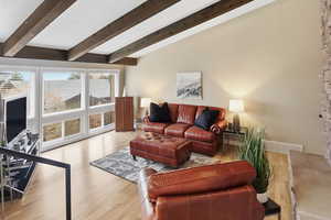 Living area with wood finished floors
