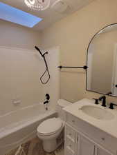 Full bath featuring  shower combination and vanity