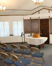 Carpeted versatile space with a carpet, vaulted ceiling, and ornamental molding
